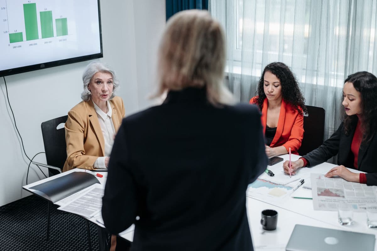 A team reviewing compensation data on screen