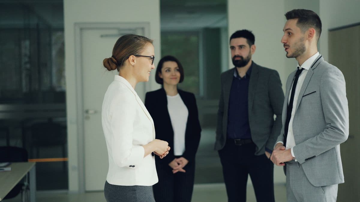 Colleagues reviewing HR policies in a meeting